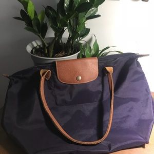 Large Purple Nylon LongChamp shoulder tote.